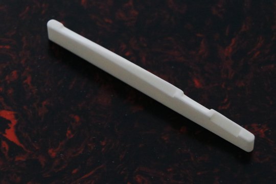 White (bleached) bone saddles, compensated